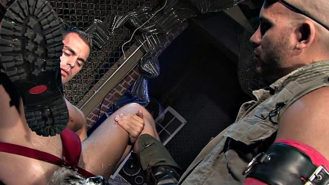 Lubed athletic bottom getting fingered by stud