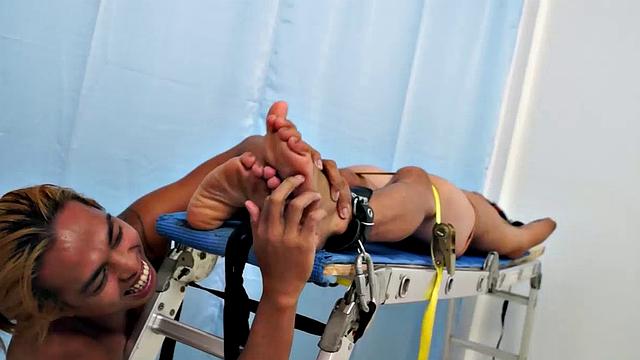 Introducing cute and ticklish Asian twink Jojo. This is his first shoot with Laughing Asians. Our long haired Asian boy Hunter is the sadistic tickler who has strapped Jojo on the tickle rack and puts him through his first tickle experience.