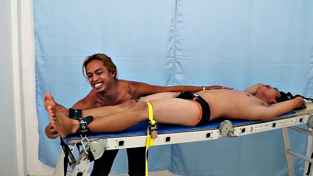 Introducing cute and ticklish Asian twink Jojo. This is his first shoot with Laughing Asians. Our long haired Asian boy Hunter is the sadistic tickler who has strapped Jojo on the tickle rack and puts him through his first tickle experience.