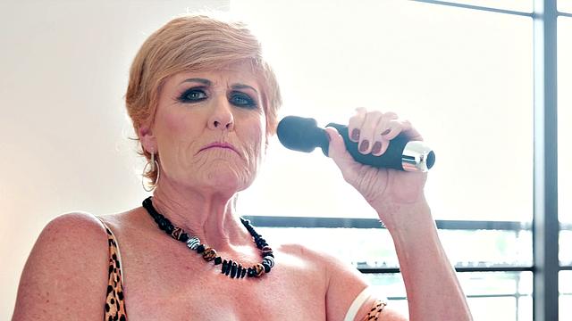 The big-titted granny with gaping pussy