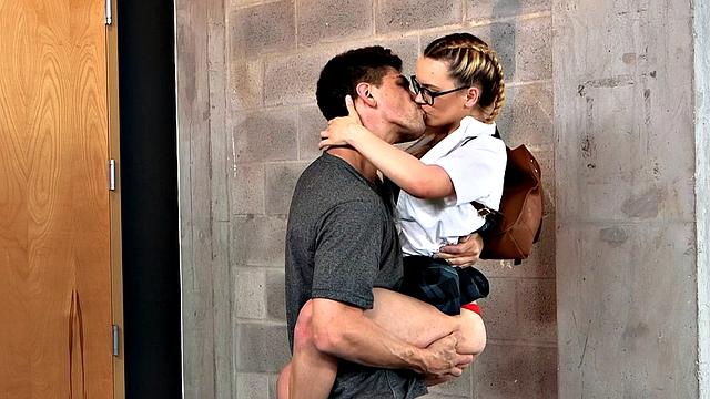 Blonde with tattoos and big tits gets a pigtail ride while kissing and fingering her bald pussy in reverse cowgirl threesome