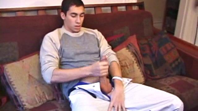 Levi Davis starts watching a porn video and pulls a monster cock out of his pants. A good stroking on his rock hard dick produces a creamy cum load in his hands.