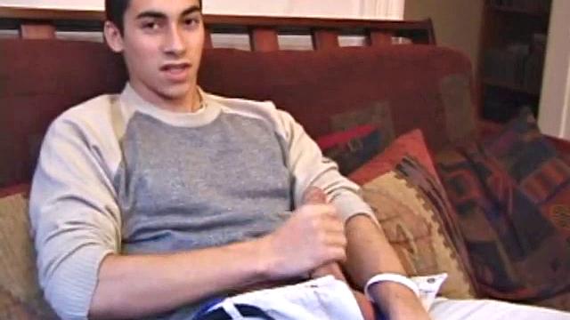 Levi Davis starts watching a porn video and pulls a monster cock out of his pants. A good stroking on his rock hard dick produces a creamy cum load in his hands.