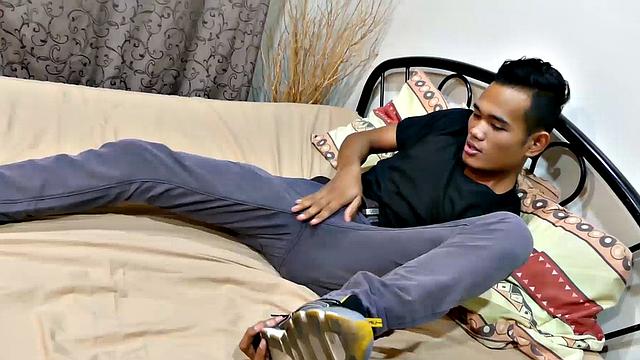 Joshua is a kinky Asian boy, who gets off on male feet. He just got home from a long day at work, and nothing turns him on more than the sweet aroma of feet that have spent all day penned up in his shoes.