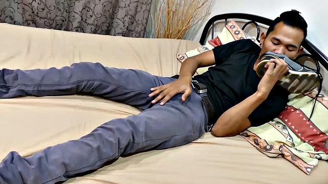 Joshua is a kinky Asian boy, who gets off on male feet. He just got home from a long day at work, and nothing turns him on more than the sweet aroma of feet that have spent all day penned up in his shoes.