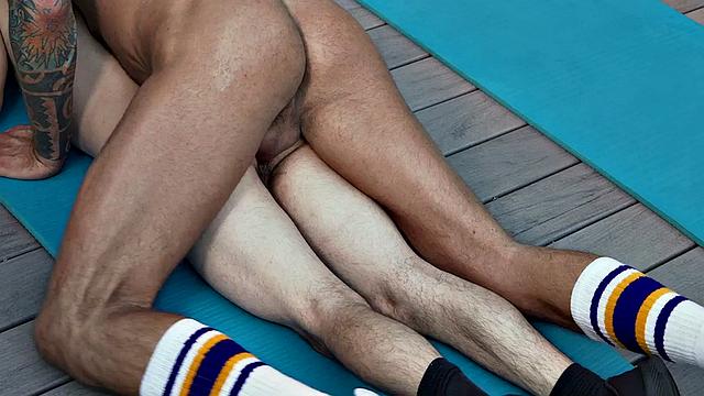 Tiny twink rides athletic inked hunk outdoors