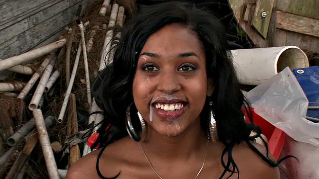 A hot babe with a tattoo give a steamy one-on-one car blowjob and get a hot facial