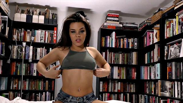 Tugging POV babe wanks oiled dick with feet and hands