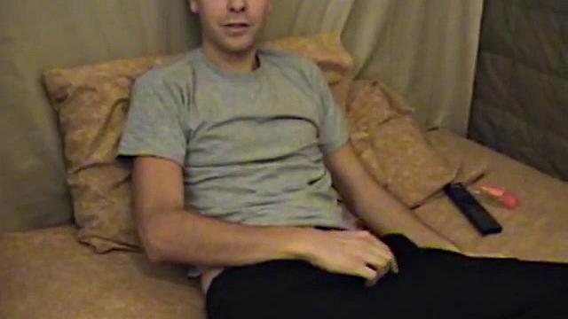 Young amateur Vincenzo takes advantage of some down time and watches a porn video. He strokes up a boner and after a jerk off session releases a high-flying cum shot.