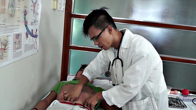 Asian breeding by doctor after exam