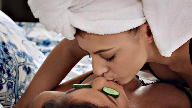 Asian lesbians in lingerie and thongs share a bedroom fun with pussy fingering and face sitting