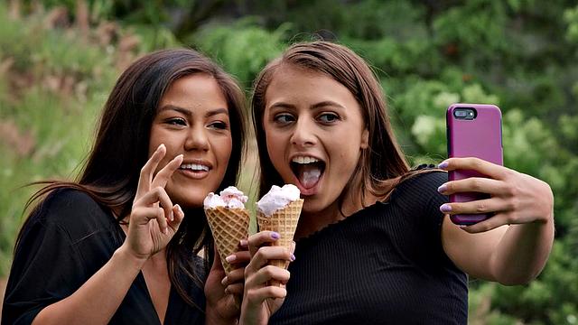 Asian lesbians in lingerie and thongs share a bedroom fun with pussy fingering and face sitting