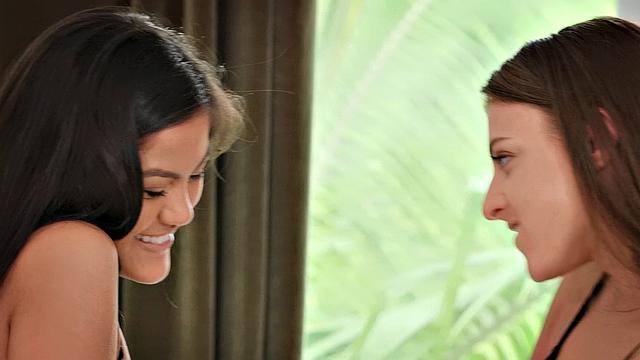 Asian lesbians in lingerie and thongs share a bedroom fun with pussy fingering and face sitting