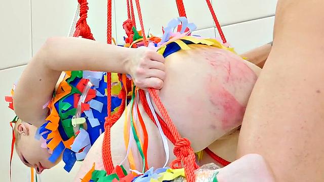 Submissive dressed as pinata gets anally ravaged