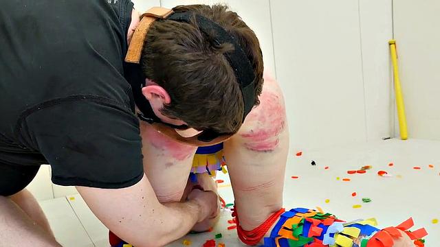 Submissive dressed as pinata gets anally ravaged