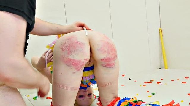 Submissive dressed as pinata gets anally ravaged