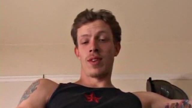 Shane gets stroked by a strong hand and moans with pleasure
