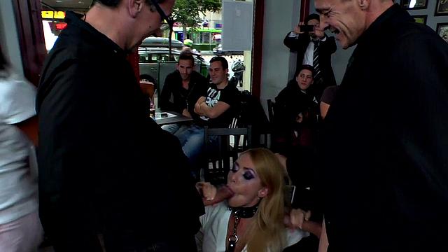 Curvy sub tugging and sucking in public with voyeurs watching