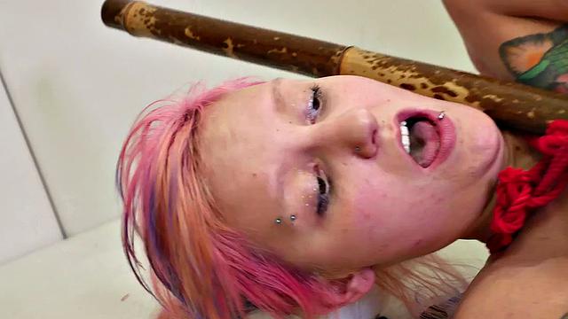 Tird up slut gagging on cock