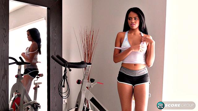 Hot black Berlyn is all smiles as she makes herself cum after a workout in a home gym.