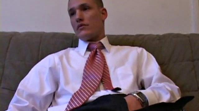 Jay unzips, pulls out a raging boner, and strokes to a porn video. After stripping, he works his dick while talking to the camera. Soon, he explodes an awesome cum gusher on his face and chest.