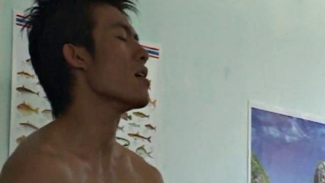 These Asian boys are chilling in the break room when their coach enters. Moo says he's bored and asks the Coach to show them. The coach whips it out for all the boys to see.