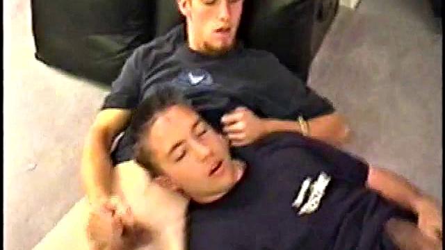 While Adam and Johnny watch porn, they get naked and begin stroking until Johnny decides to suck for the first time. From the look on Adam's face he's pretty good at it.