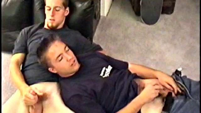 While Adam and Johnny watch porn, they get naked and begin stroking until Johnny decides to suck for the first time. From the look on Adam's face he's pretty good at it.