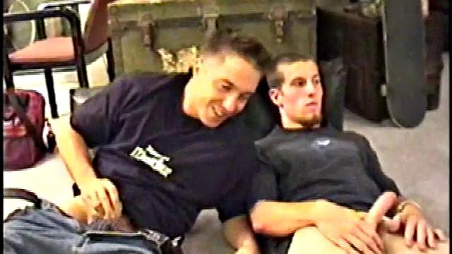 While Adam and Johnny watch porn, they get naked and begin stroking until Johnny decides to suck for the first time. From the look on Adam's face he's pretty good at it.