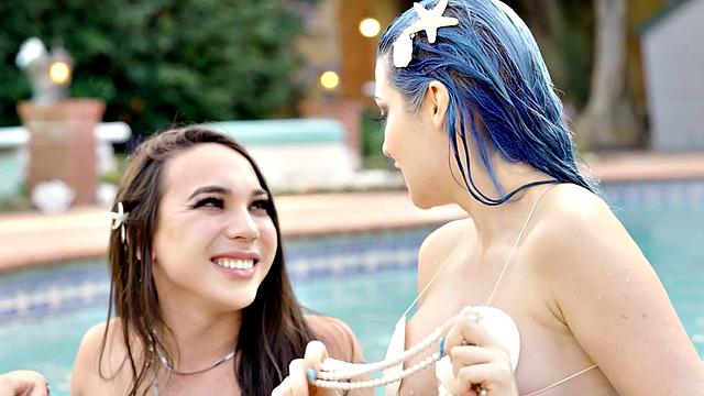 Small boobs TS mermaid fucks babe outdoors by swimming pool