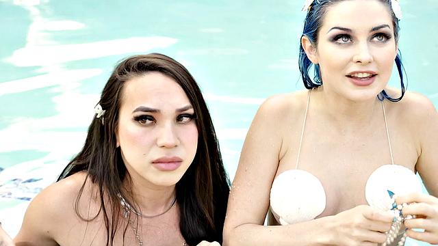 Small boobs TS mermaid fucks babe outdoors by swimming pool