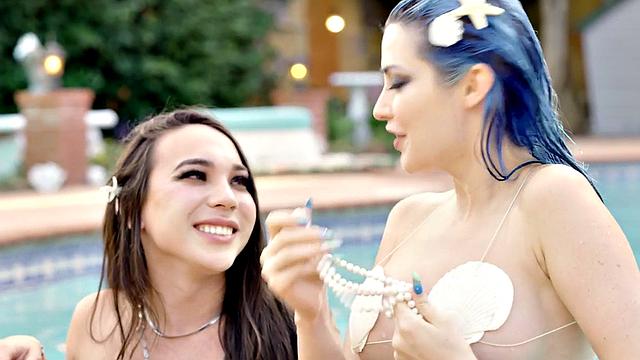 Small boobs TS mermaid fucks babe outdoors by swimming pool