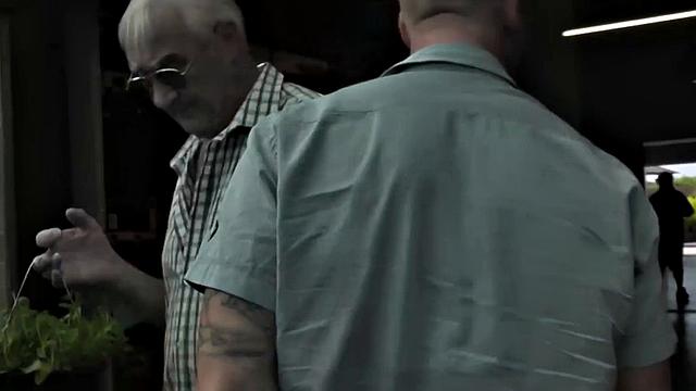 Inked mature skank fucking two dicks