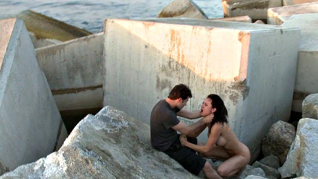 BDSM public slut deepthroats in front of outdoor voyeurs