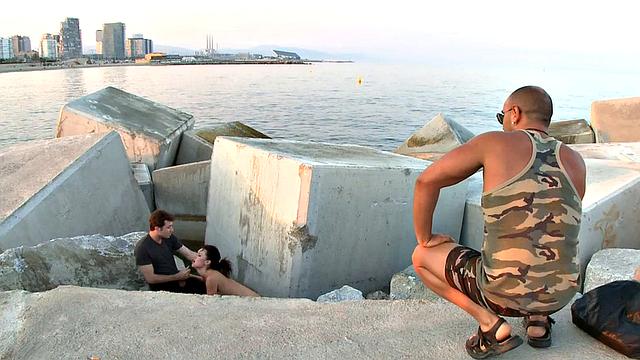 BDSM public slut deepthroats in front of outdoor voyeurs