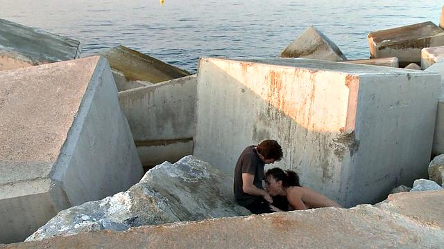 BDSM public slut deepthroats in front of outdoor voyeurs