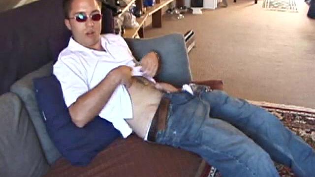 Johnny is back and this time he' swearing a preppy polo shirt and shades. He quickly settles down and gets into his alone time. After oiling up his cock, Johnny strokes it while watching a porn video, and occasionally narrating.