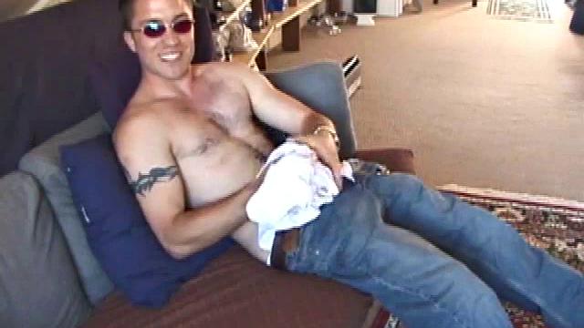 Johnny is back and this time he' swearing a preppy polo shirt and shades. He quickly settles down and gets into his alone time. After oiling up his cock, Johnny strokes it while watching a porn video, and occasionally narrating.