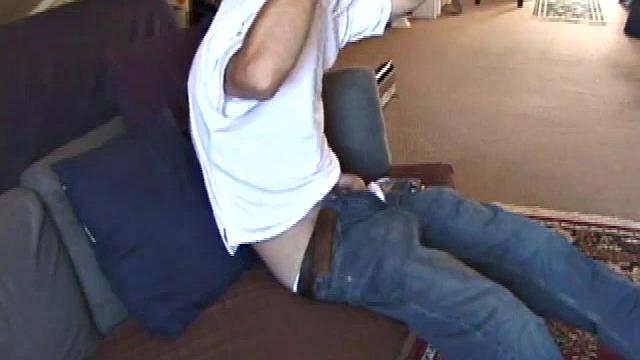 Johnny is back and this time he' swearing a preppy polo shirt and shades. He quickly settles down and gets into his alone time. After oiling up his cock, Johnny strokes it while watching a porn video, and occasionally narrating.