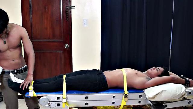 Get ready for a super kinky, super erotic tickle fetish experience with a cute and sexy Asian boy and an exceptionally hot gay Asian boy as the tickler. Hermis has Willy strapped down on the tickle rack for his kinky enjoyment.