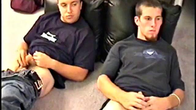 While Adam and Johnny watch porn, they get naked and begin stroking until Johnny decides to suck for the first time. From the look on Adam's face he's pretty good at it.