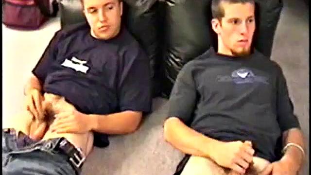 While Adam and Johnny watch porn, they get naked and begin stroking until Johnny decides to suck for the first time. From the look on Adam's face he's pretty good at it.