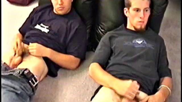 While Adam and Johnny watch porn, they get naked and begin stroking until Johnny decides to suck for the first time. From the look on Adam's face he's pretty good at it.