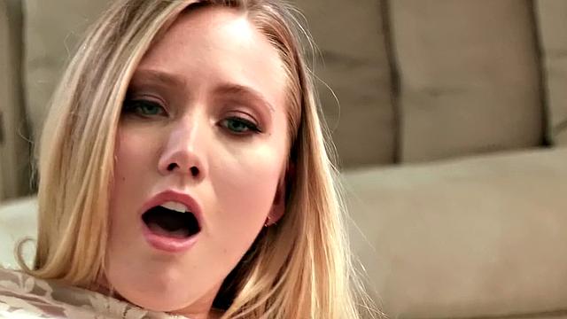 A pierced babe play with her toy in front of the mirror