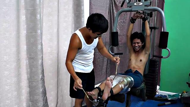 These boys just keep coming for a workout, and they surely get one! This time Asian cutie Idol gets restrained to the equipment for a hearty tickle workout on every muscle of his body.