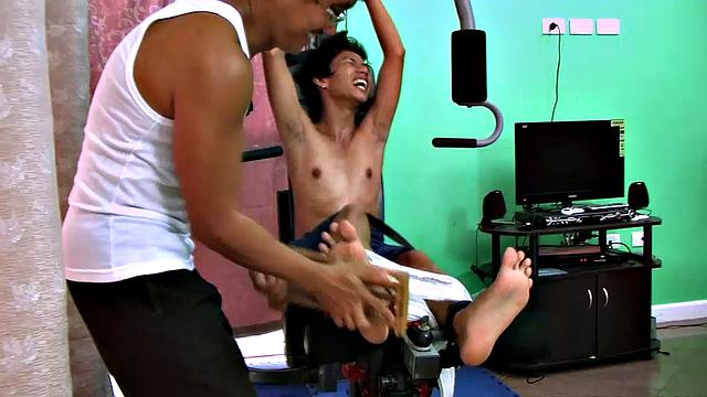 These boys just keep coming for a workout, and they surely get one! This time Asian cutie Idol gets restrained to the equipment for a hearty tickle workout on every muscle of his body.
