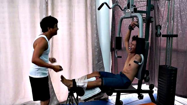 These boys just keep coming for a workout, and they surely get one! This time Asian cutie Idol gets restrained to the equipment for a hearty tickle workout on every muscle of his body.