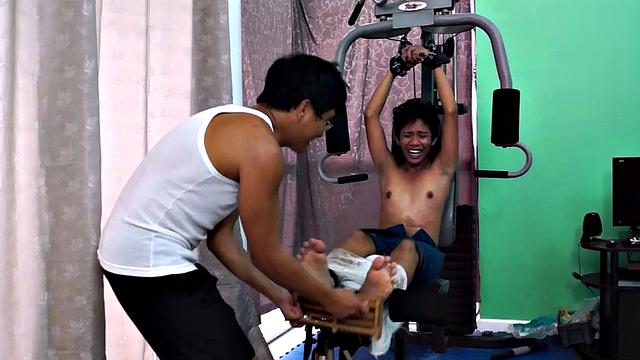 These boys just keep coming for a workout, and they surely get one! This time Asian cutie Idol gets restrained to the equipment for a hearty tickle workout on every muscle of his body.