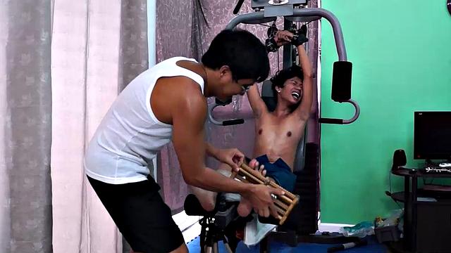 These boys just keep coming for a workout, and they surely get one! This time Asian cutie Idol gets restrained to the equipment for a hearty tickle workout on every muscle of his body.