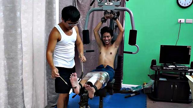 These boys just keep coming for a workout, and they surely get one! This time Asian cutie Idol gets restrained to the equipment for a hearty tickle workout on every muscle of his body.